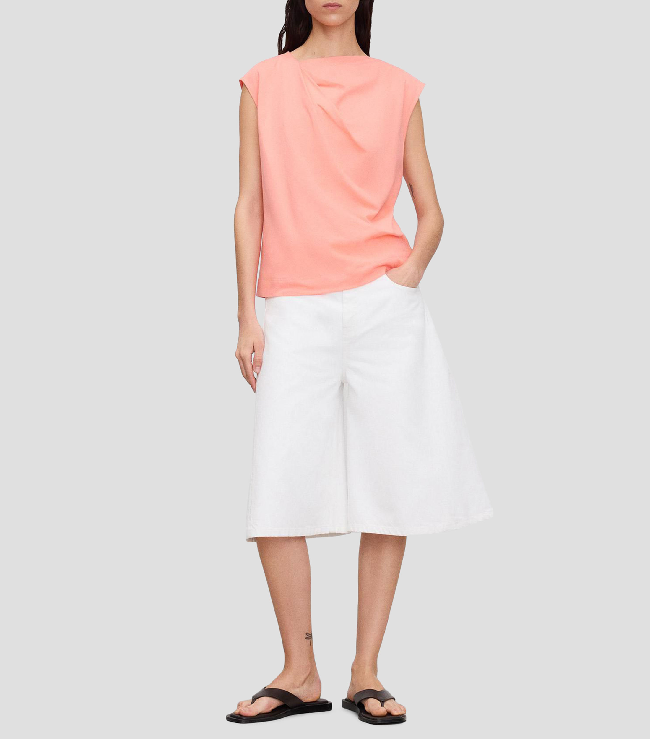 Blusa lisa sin mangas Mujer